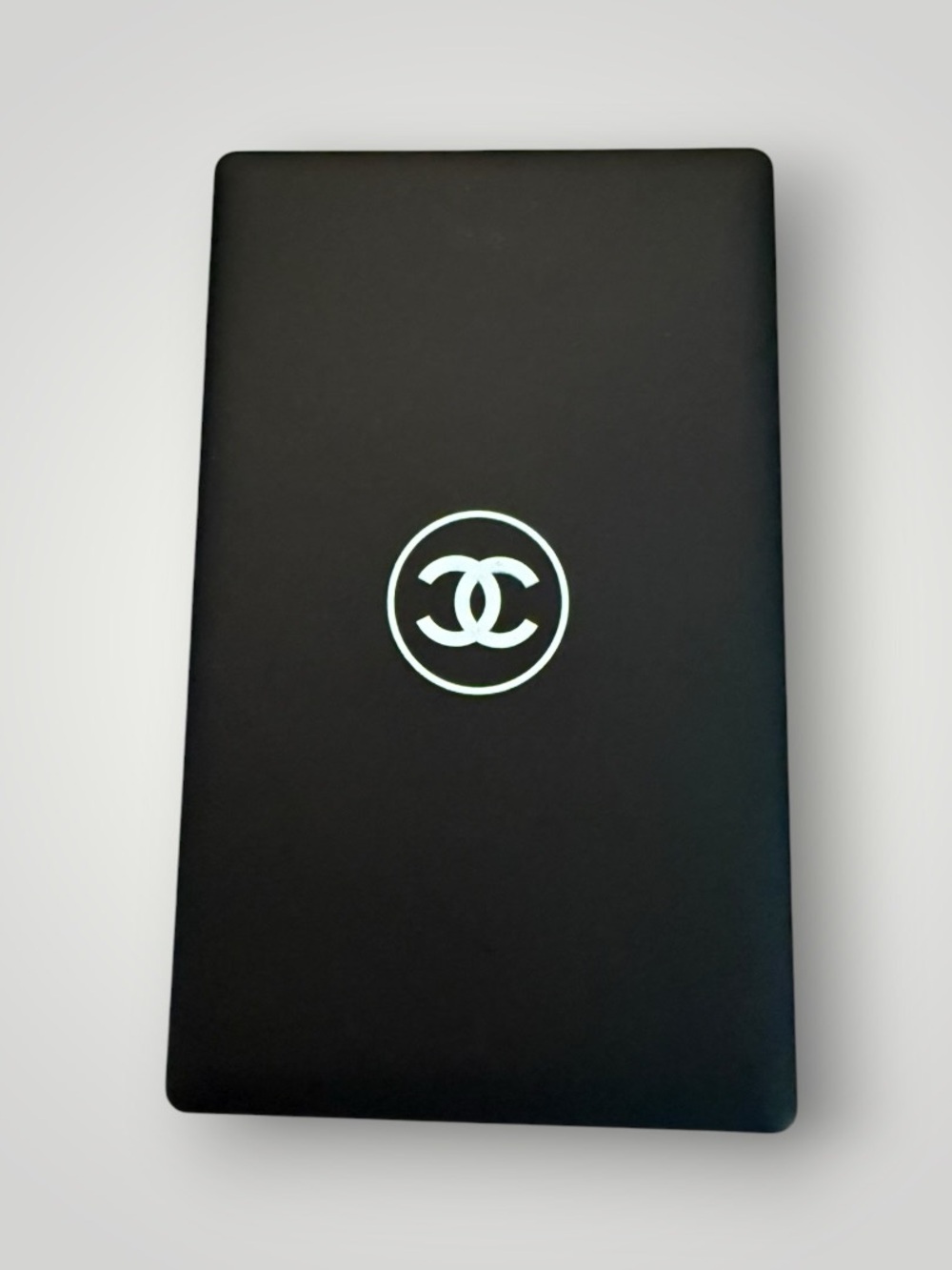 Source Unknown Black Compact Mirror with White Interlocking Logo